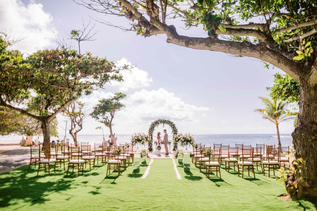 Couple during beachfront Bali wedding ceremony inspiration